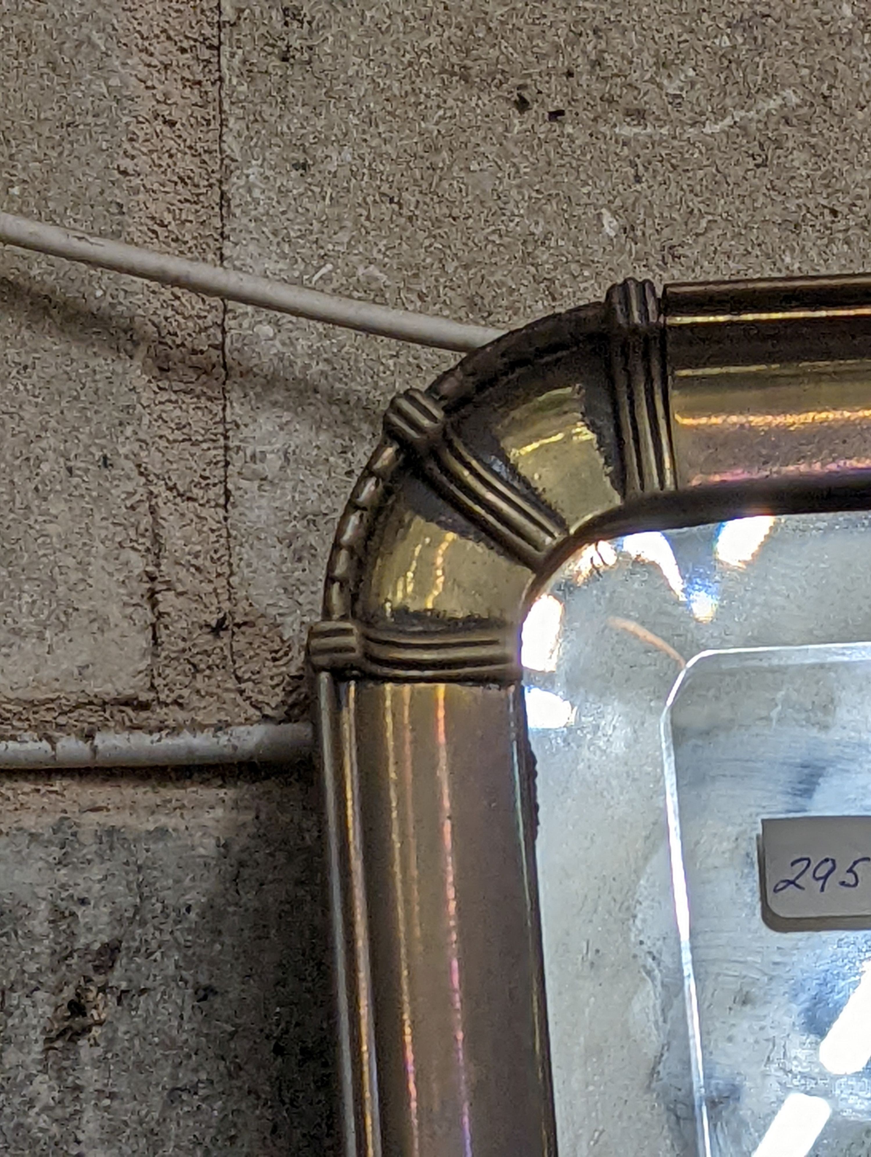 An Edwardian rectangular brass-framed mirror, width 82cm, height 56cm